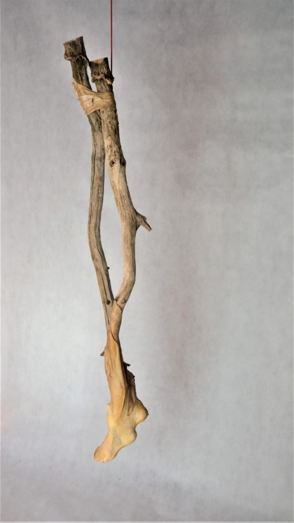 Desublimation, 153 × 28 × 29 cm, wood, leather, gypsum, 2022
